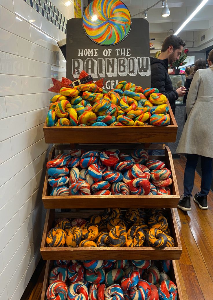 New York City rainbow bagels place food idea cafe Rainbow Bagels Nyc, Bagel Shop Interior Design, Liberty Bagels Nyc, Bagel Display, Bagels Nyc, Rainbow Bagel, Rainbow Bagels, New York Bagels, Bagel Cafe