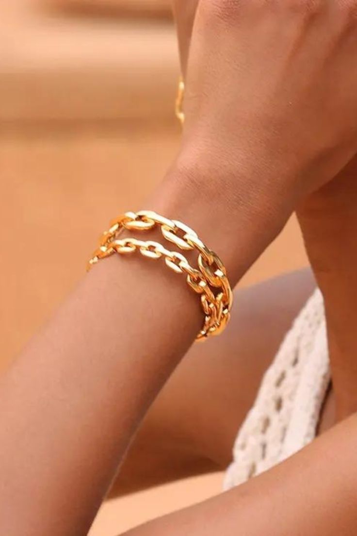 The Vienna Large Cuff has been designed to fit most wrists and is adjustable to ensure a comfortable fit for everyone. Its unique shape and design will make you stand out from the crowd and draw all the compliments your way. Product Detail 18k gold plated hypoallergenic adjustable Jewelry photos are enlarged to show detail. Packaging Every Ose purchase will arrive in a box . In that box our pieces are placed in our microfiber pouches or white jewelry boxes. All boxes and pouches are designed to Elegant Gold Resizable Cuff Bracelet, Elegant Resizable Gold Cuff Bracelet, Trendy Gold Cuff Bangle, Adjustable Gold-tone Cuff Bracelet Gold Plated, Trendy Adjustable Gold Plated Cuff Bracelet, Gold Resizable Cuff Bracelet Gift, Trendy Gold Cuff Bracelet, Adjustable Resizable Gold Bangle, Trendy Gold-tone Cuff Bracelet Bangle