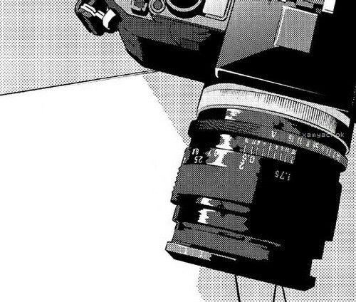 a black and white photo of an old film camera with the lens attached to it