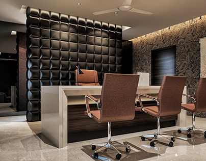 an office with chairs and a counter in the middle of it, next to a wall that has black tiles on it