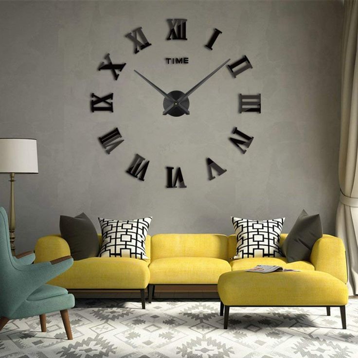 a living room filled with furniture and a large clock on the wall