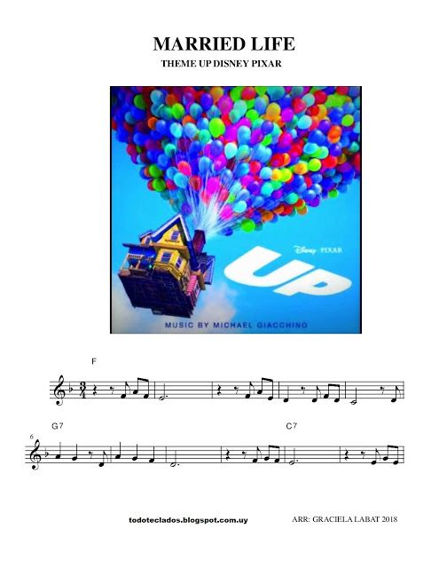 sheet music with an image of a house and balloons in the air on top of it