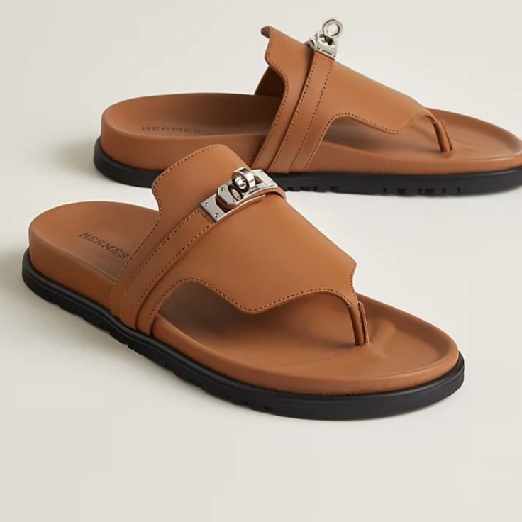 Brand New Authentic Women's Empire Sandals.Techno-Sandal In Calfskin With Anatomical Sole And Iconic Palladium-Plated Kelly Buckle. Made In Italy. - Worn Once - Sold Out In This Color And Size - Come With Original Dustbags And Box Color: Natural Size: 37 Designer Toe Post Sandals For Summer, Leather Sandals With Round Toe In Sand Color, Sand Colored Leather Sandals With Round Toe, Sand Leather Sandals With Round Toe, Sand-colored Leather Sandals With Round Toe, Designer Leather Flip Flops For Summer, Luxury Leather Open Toe Flip Flops, Designer Leather Flip Flops For Beach, Designer Leather Flip Flops For The Beach