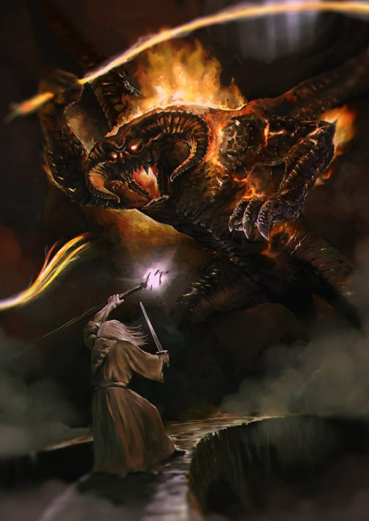 a man standing next to a giant dragon on top of a mountain in front of a fire