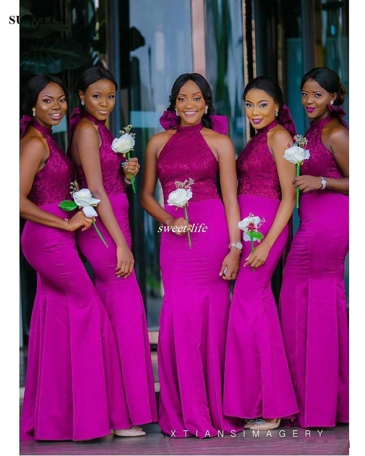 the bridesmaids are wearing bright pink dresses