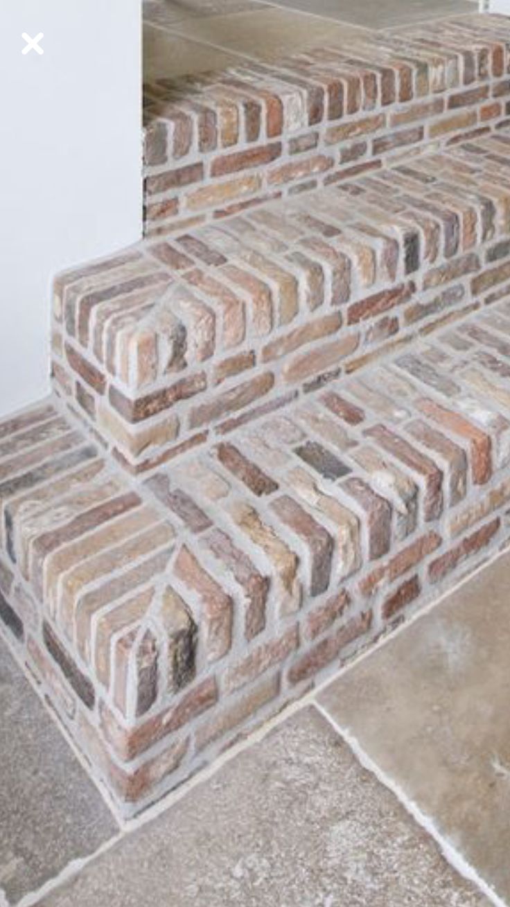 the steps are made out of bricks and cement