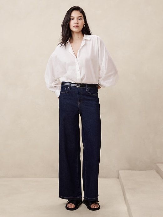 Versatile Denim Blue Cotton Jeans, Versatile Dark Wash Cotton Flare Jeans, Versatile Dark Wash Cotton Jeans, Classic Washed Jeans For Workwear, Classic Washed Jeans For Work, Versatile Relaxed Fit Dark Wash Jeans, Versatile Dark Wash Relaxed Fit Jeans, Denim Campaign, Black Flare Jeans