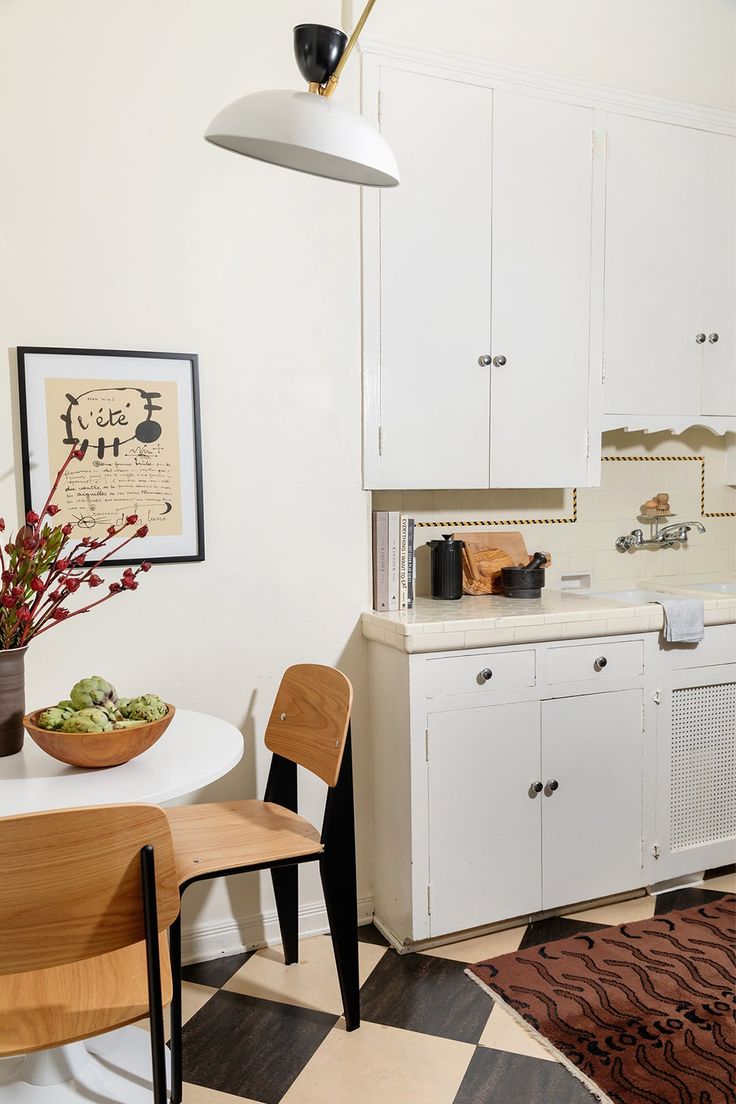 the kitchen is clean and ready to be used for cooking or dining, while still in use