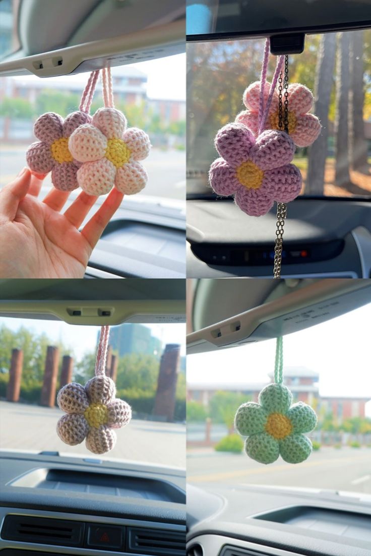 four different pictures of flowers hanging from the dashboard