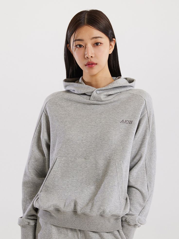 Editor's NotesThis is a comfortable hoodie suitable for daily wear. It gives a casual and trendy vibe.- Logo embroidery on the front chest- Relaxed silhouette- Ribbed hem and cuffMeasurements (in.)S/M/L/XL- Shoulder: 18.50 in. / 19.29 in. / 20.87 in. / 21.65 in.- Chest: 21.26 in. / 22.24 in. / 24.41 in. / 25.39 in.- Sleeve: 22.83 in. / 23.23 in. / 25.39 in. / 25.79 in.- Length: 22.83 in. / 23.62 in. / 26.97 in. / 27.76 in.Composition & Care- Polyester 54% Cotton 46%- Refer to care Gray Athleisure Hoodie, Casual Athletic Heather Sweatshirt With Double-lined Hood, Gray Athleisure Hoodie For Everyday, Casual Athletic Heather Sweatshirt With Adjustable Hood, Basic Gray Hoodie With Drawstring, Basic Gray Sweatshirt With Double-lined Hood, Casual Athletic Heather Hoodie With Drawstring, Comfortable Gray Cotton Hoodie, Urban Gray Tops With Drawstring Hood