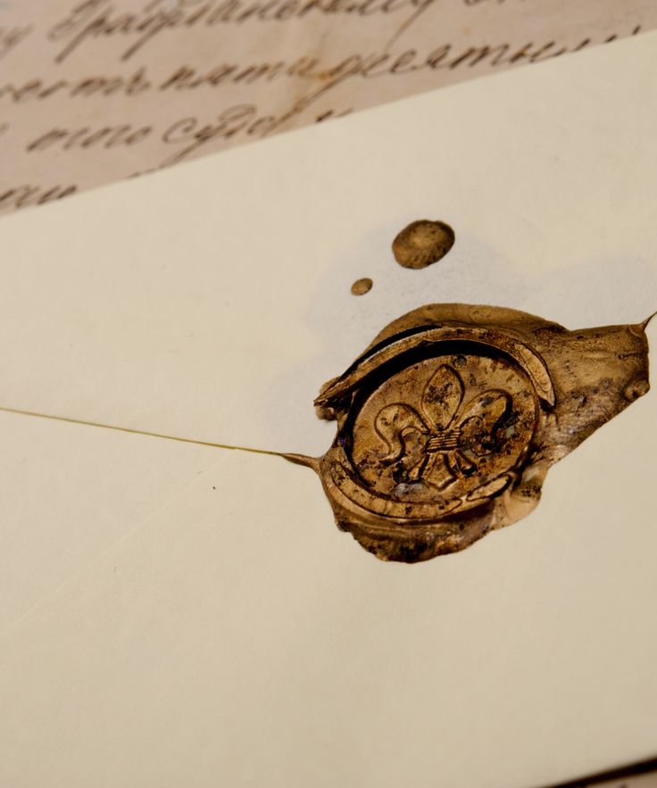 an old letter with waxed seal on it