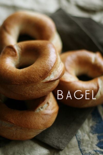 bagels stacked on top of each other with the words bagel in front of them