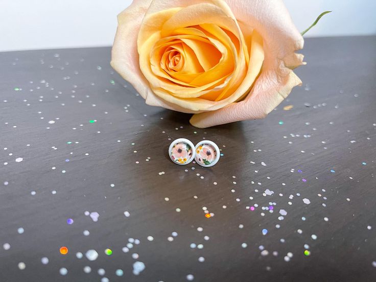 8mm earring on white post. All earrings fit standard size piercings Piercings, Stud Earrings, Floral