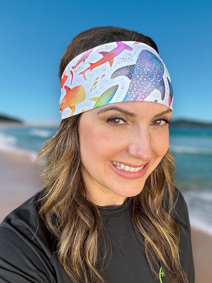 If you're on the hunt for a headband that'll stay put while you're active, search no more! This stretchy headband, crafted from swimsuit material, is exactly what you need. This headband is particularly helpful for water sports enthusiasts as it stays securely in place underwater, allowing you to enjoy observing the fish while SCUBA diving or snorkeling instead of being distracted by hair floating in front of your face. It's also perfect for high-intensity workouts since it dries quickly after g Adjustable Sweatband Headband, White Elastic Headband For Summer, Stretch Bandeau Headband For Summer, Elastic Sweatband Headband, Adjustable Summer Band Headband, Adjustable Cotton Sweatband Headband For Summer, White Sweatband Headband, Summer Beach Headband, Adjustable Elastic Summer Headband