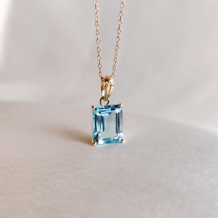 This stunning pendant is set in 14K Solid Yellow Gold studded with Sky Blue Hydro in classic prong setting. It is an unique gemstone pendant for nearly every occasion and is completely hassle-free jewelry. ◾ITEM DETAILS * Gem:  Sky Blue Hydro * Gem Size: 8X10mm * Gem Shape: Octagon cut * Gem Weight: 3.85 carats * Gold Purity: 14KT  * Gold Weight: 0.60 gram * Total Weight of the Pendant: 1.37 gram The Gold purity is guaranteed and it comes with authentic 14KT gold hallmark. Since my items are han Gold Skies, Handmade Jewelry Box, Unique Gemstones, Valentine Gift, Gold Studs, 14kt Gold, Solid Yellow, Free Jewelry, Gemstone Pendant