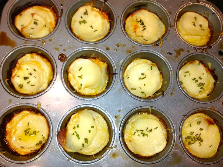 muffin tins filled with different types of food