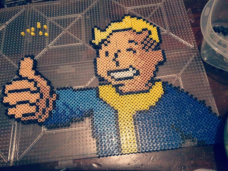 an image of a man made out of legos on the floor with thumbs up