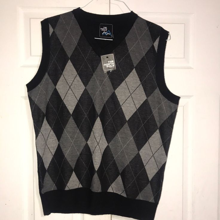 Brand New V-Neck Vest. Argyle Pattern Of Dark, Medium, & Light Gray With White & Black Stitching Separating The Different Colors. The Back Is Solid Black. Sz L. Dark Sweater, Blue Cashmere Sweater, Black Quarter Zip, Argyle Sweater Vest, Sweater Vest Mens, Argyle Pattern, The North Pole, Star Sweater, Embroidered Crewneck