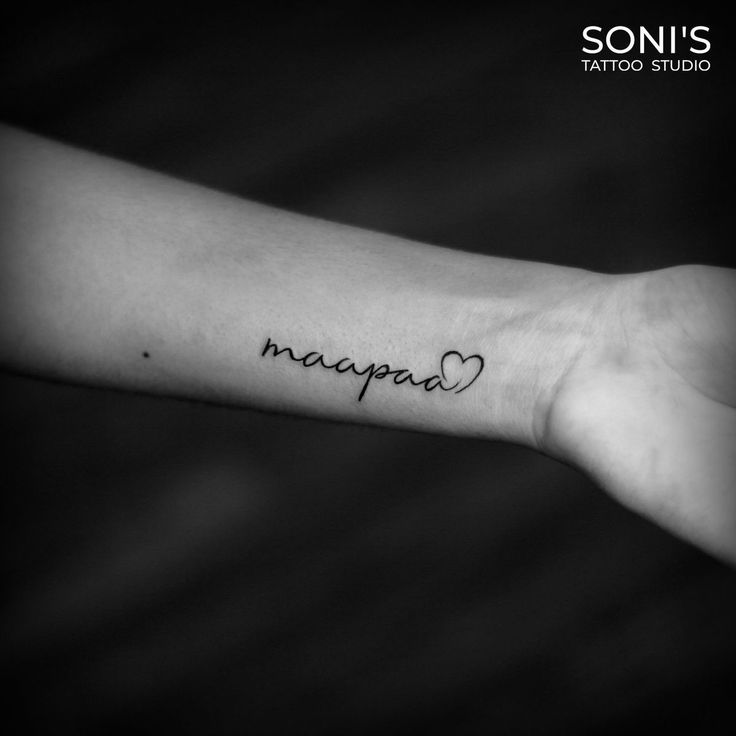 a person's arm with a tattoo on it that says nappa and heart