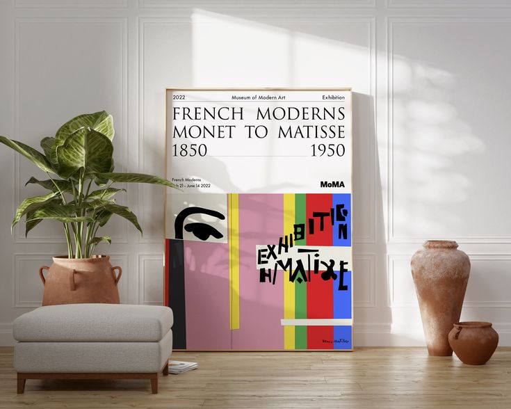 a living room with a couch, chair and large poster on the wall that says french moderns monet to matisse 1950