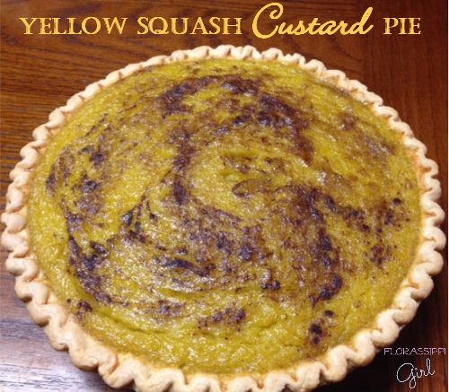 a yellow squash custard pie sitting on top of a wooden table