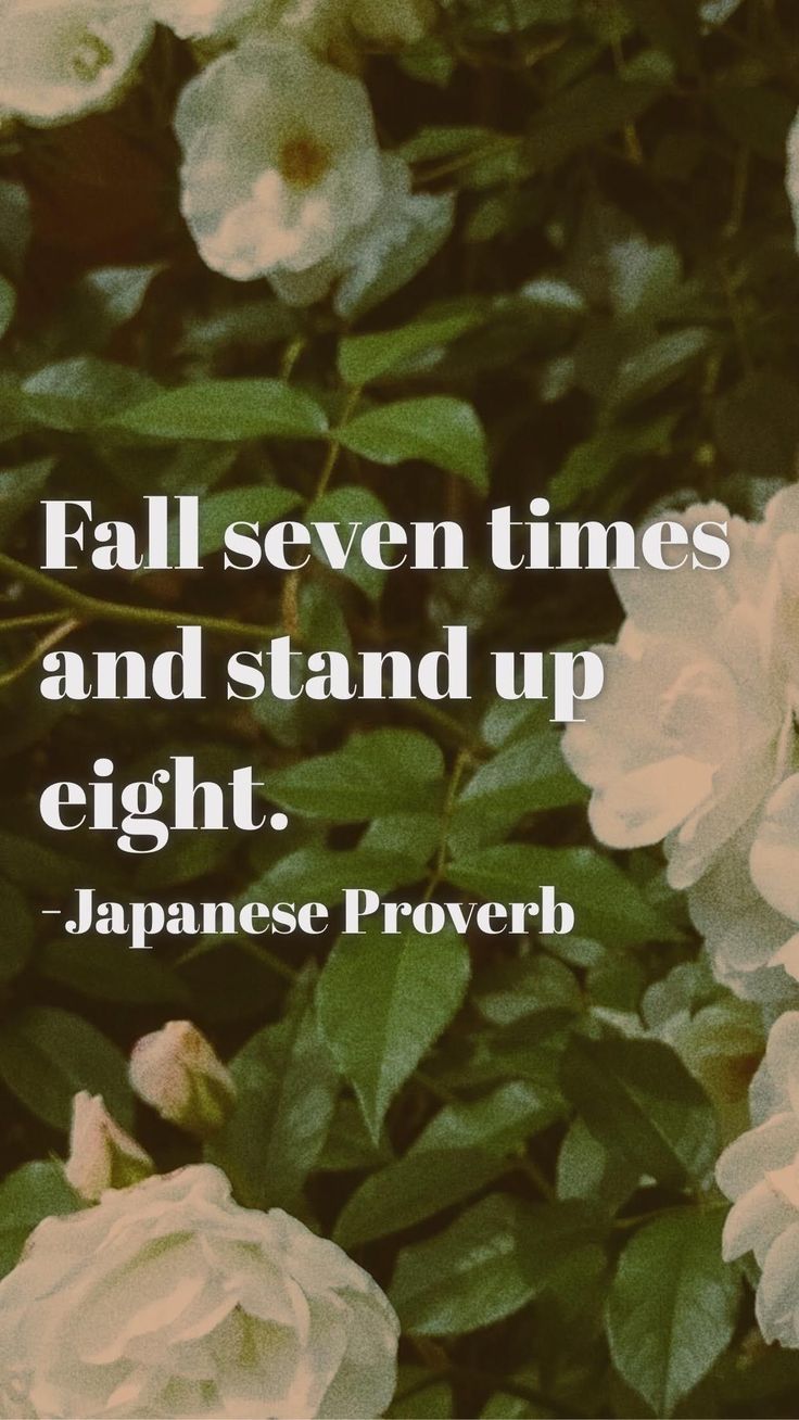 some white flowers and green leaves with a quote about fall seven times and stand up eight