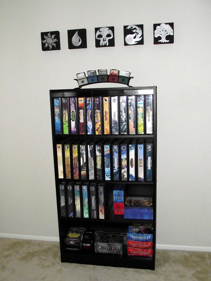 a book shelf filled with lots of video games