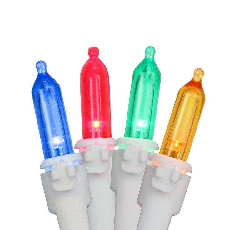 multicolored lights are lined up in the shape of tubes on white paper tube holders