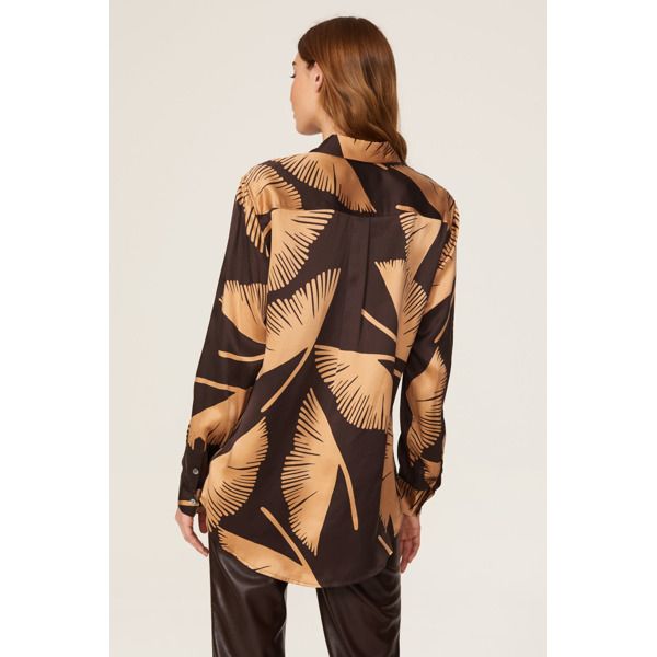 Brown printed silk (100% Silk). Top. Collared neckline. Long sleeves. Front button closure. 29" from shoulder to hemline. Imported. Chic Button-up Shirt With Graphic Print, Abstract Print Tops For Fall Workwear, Abstract Print Workwear Tops For Fall, Fall Workwear Tops With Abstract Print, Silk Button-up Tops For Fall, Graphic Print Button-up Blouse For Fall, Fall Graphic Print Button-up Blouse, Fall Silk Button-up Tops, Chic Collared Blouse With Graphic Print