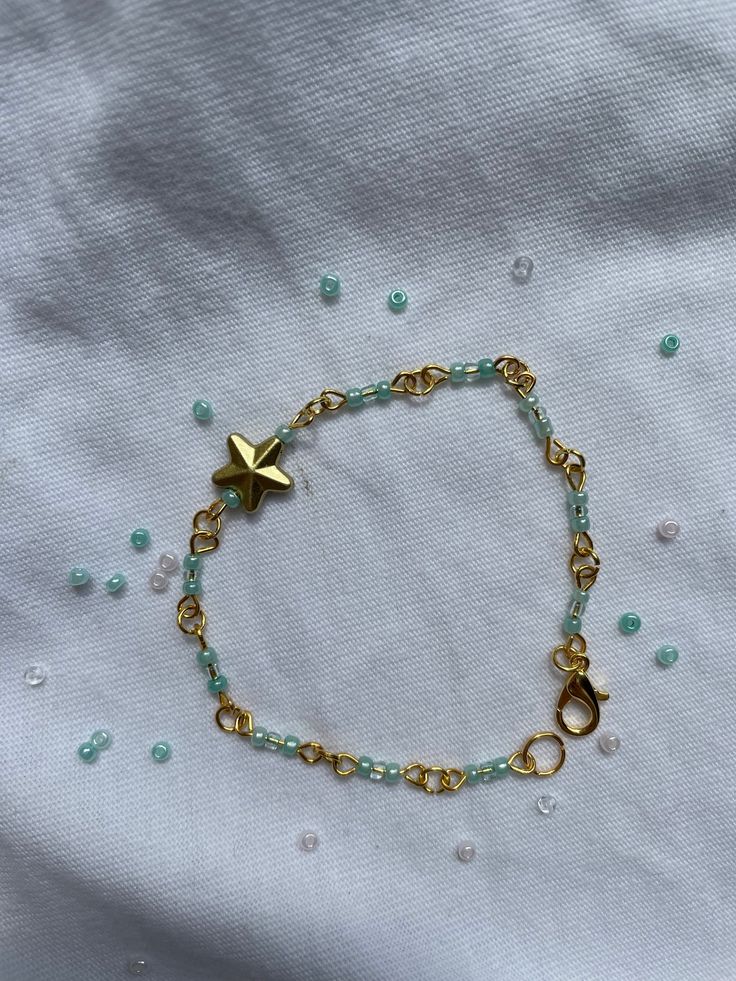 Handmade bracelet made from steel jumprings and eyepins! ఌ✩ With star and colorful beads ☆☆彡 Now also shipping internationally!! The color of the beads can also be customized (stars: gold, silver & rose) small beads all colors! Customized Orders might take a little longer (not more than one additional day!❤︎︎) If you have any questions let me know I'd be very glad to answer them☆ఌ𖦹꧂ Stars Gold, Pearl Bracelet Gold, Small Beads, Handmade Bracelet, Bracelet Gold, Silver Roses, Pearl Bracelet, Handmade Bracelets, Bracelet Making