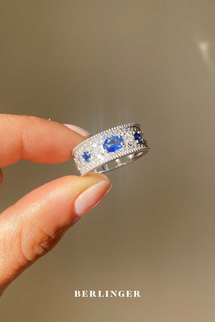 Sapphire Engagement Rings Luxury Oval Diamond Cut Sapphire Ring, Oval Sapphire Diamond Ring With Diamond Cut, Oval Diamond-cut Lab-created Sapphire Ring, Luxury Oval Lab-created Sapphire Ring, White Gold Sapphire Ring With Diamond Oval Cabochon, Oval Sapphire Diamond Ring With Accents, Sapphire Diamond Ring With Rose Cut Diamonds, Oval Diamond Cut Sapphire Ring Fine Jewelry, Oval Diamond Ring With Lab-created Sapphire And Diamond Accents