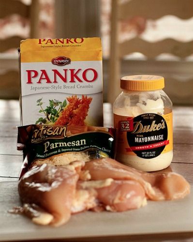 some food is laying out on a table next to a box of panko and other items