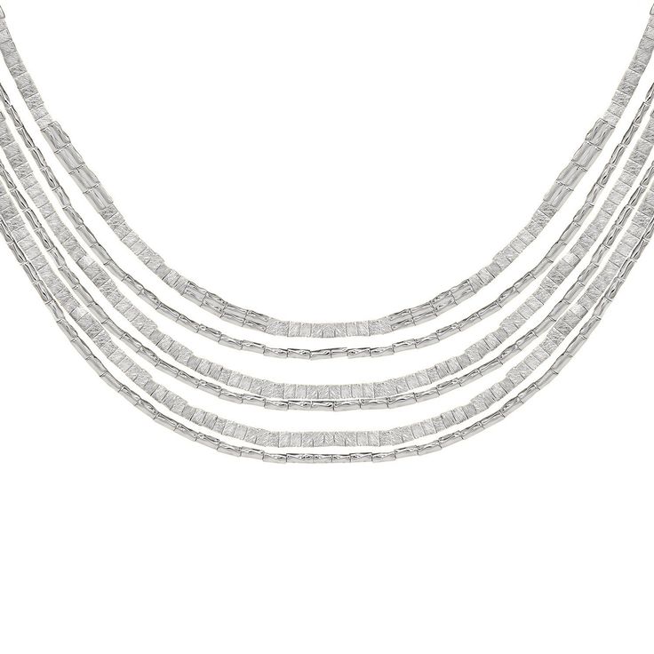 This 18k gold plated and rhodium plated necklace features layered strands of small square beads, attached with a magnetic closure. The longest strand measures 20 inches, while the shortest measures 16 inches. Handmade in Brazil, it offers a chic and contemporary style. It pairs with Nubia, Khalida or Nehara Bracelets. Statement Chandeliers, Casual Rings, Square Beads, Plate Necklace, Square Bead, Silver Shop, Short Necklace, Lariat Necklace, Chandelier Earrings