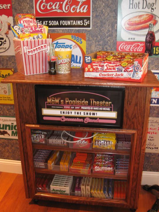 an old fashioned vending machine with snacks and sodas on it's shelf