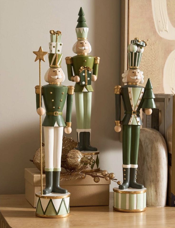 two nutcrackers are standing next to each other