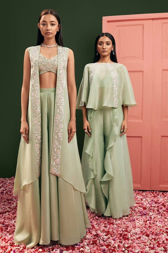 Mint tissue embroidered cape with silver zardozi and dori work paired with ruffle palazzo pant and silk bralette. - Aza Fashions Dori Work, Silk Bralette, Cropped Blouse, Blouse Pants, Fashion App, Floral Pants, Embroidered Jacket, Green Blouse, Crop Blouse