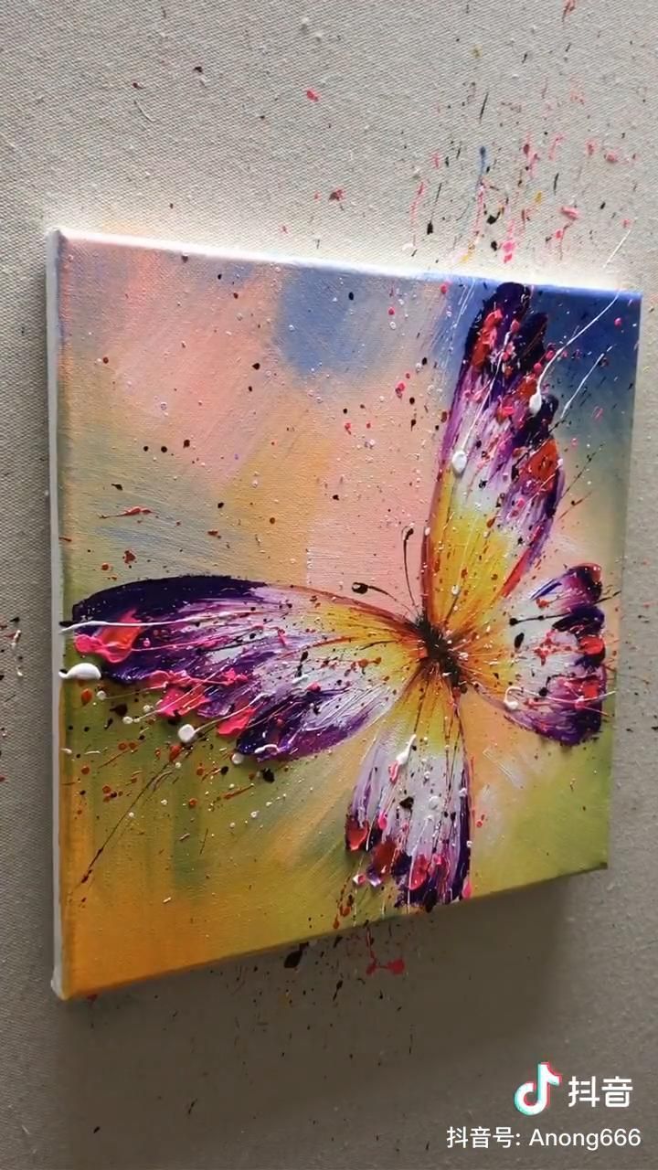 a painting of a butterfly on a wall