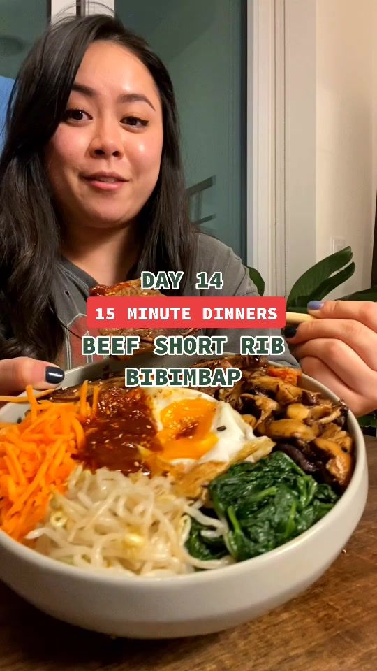 a woman sitting at a table with a bowl of food in front of her and the caption reads, day 34 13 minute dinners beef short rice birthday