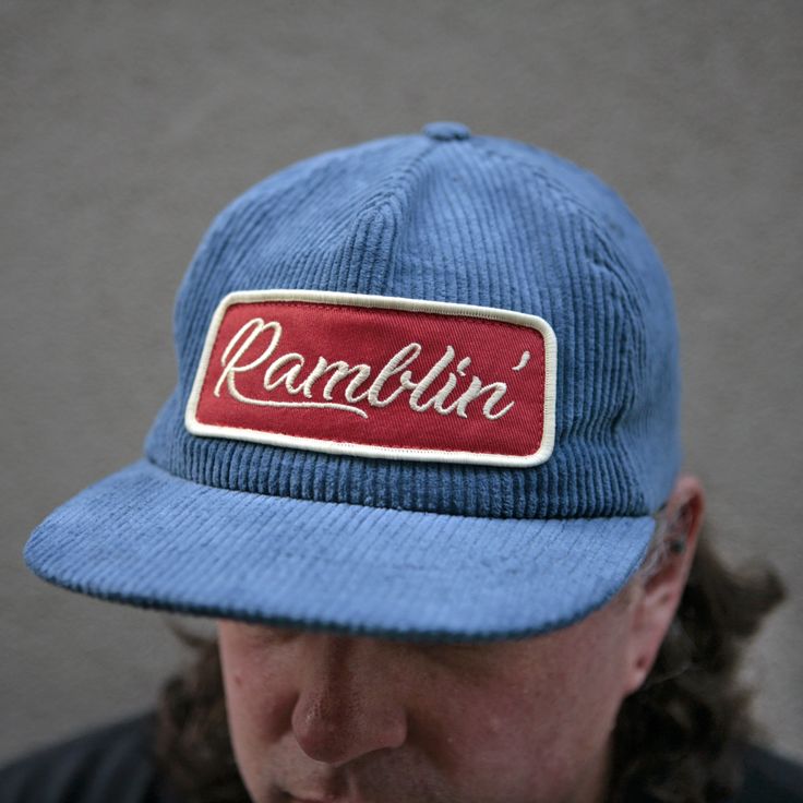 For the ramblin' man, an unstructured baseball-style adjustable cap made of smokey blue corduroy with a red and cream embroidered patch. This version is made to fit a little deeper than our other unstructured hats, which allows it to fit bigger heads. (No giant dome on your head!) Hat has an inside circumference of roughly 23-23.5 inches, but lots of flexibility with the snapback closure. Patch measures 5 inches wide. Trendy Caps, Blue Corduroy, Vintage Cap, Corduroy Fabric, Patch Design, Embroidered Patch, Black Friday Sale, Embroidered Patches, New Product