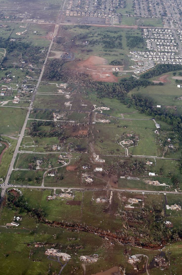 an aerial view of a city with lots of trees