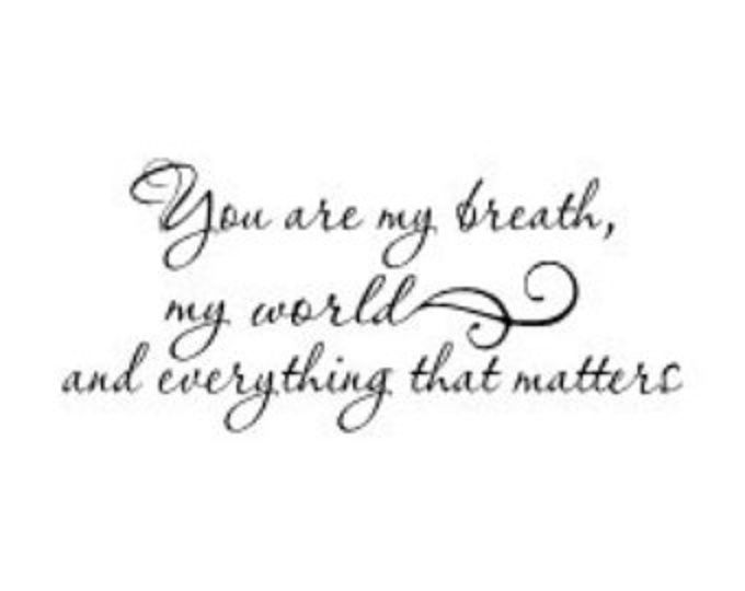 the words you are my breath, my angel and everything that matters is written in cursive writing