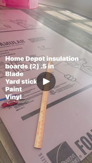 a ruler laying on top of some construction paper with the words home depot insulation boards 2 5 in yard stick vinyl