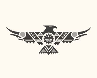 an eagle with geometric designs on it's wings