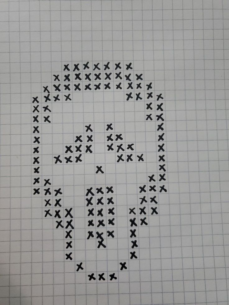 the cross stitch pattern is made up of small black crosses on a gridded paper