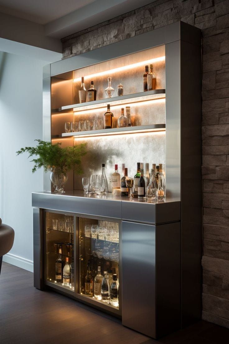 a bar with several bottles and glasses on the shelves, along with a potted plant