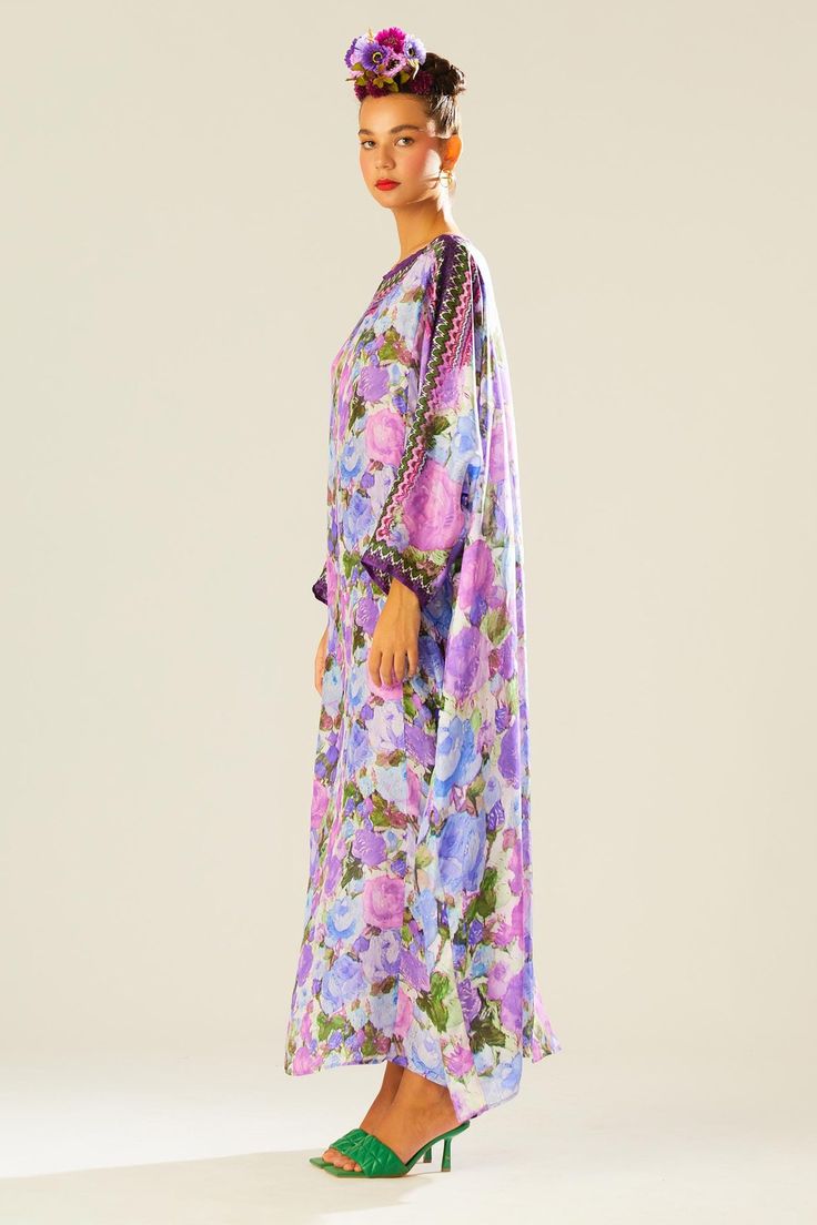 Purple kimono kaftan with floral pattern and geometric panel.
Components: 1
Type Of Work: Floral
Neckline: Boat
Sleeve Type: Flared
Fabric: Silk
Color: Purple
Other Details: 
Draped silhouette
Occasion: Resort - Aza Fashions Purple Kimono, Rajdeep Ranawat, Kimono Kaftan, Kaftan For Women, Silk Kaftan, Purple Silk, Fashion App, Fabric Silk, Purple Floral