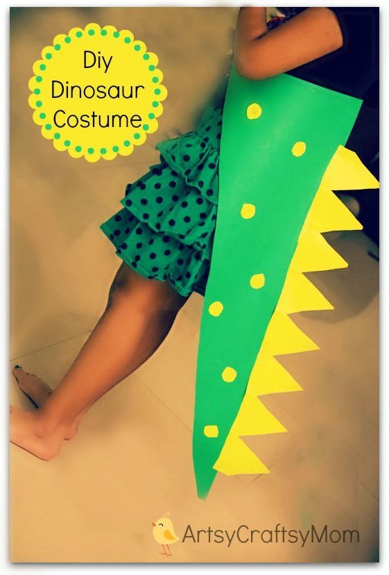 a child's legs wearing a green and yellow dinosaur costume, with the words diy dinosaur costume on it