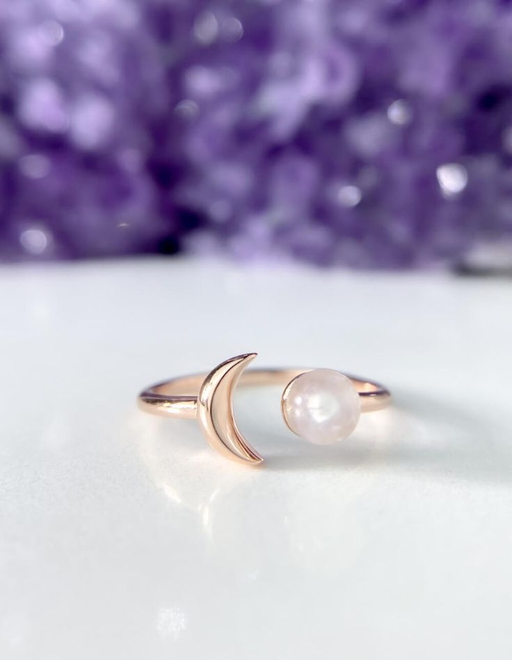 Sun and Moon Ring | Channel the power of the moon with this authentic moonstone ring. Handcrafted in 14K rose gold over sterling silver. It features an open shank sun & moon ring design and will be a wonderful addition to your ring collection. A luminous rainbow moonstone symbolizes inner growth and strength. Wear it to promote inspiration, intuition and empathy.