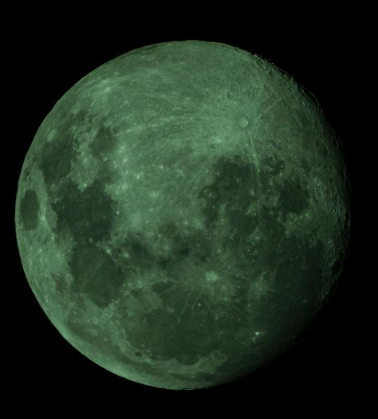 the full moon is seen in this image