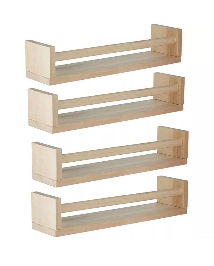 three wooden shelves are shown with one shelf on each side and the other above it